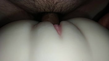 Insertion of smoothly-shaven pussy.